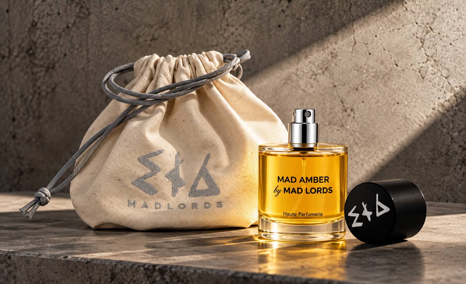 Emballage du parfum Mad Amber de Mad Lords avec le flacon et un bouchon montrant le logo